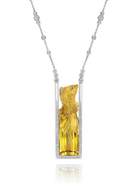 05-The Butterfly Koi white gold necklace features a 50.67-carat yellow beryl that highlights unique hand carving techniques