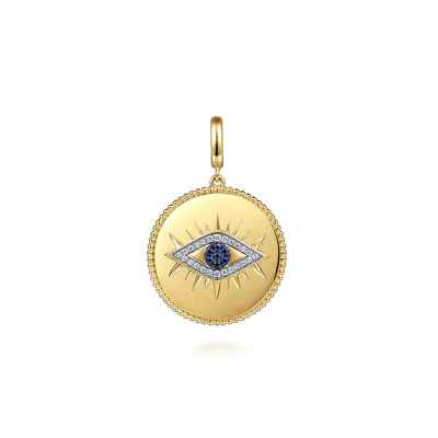 Evil eye medallion pendant in 14k gold with diamonds and sapphires, $1,875; Gabriel & Co.