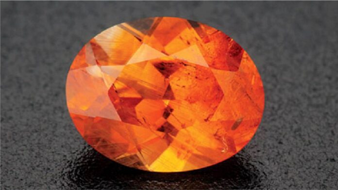 A bright orange sapphire was discovered in a Greenland ruby mine